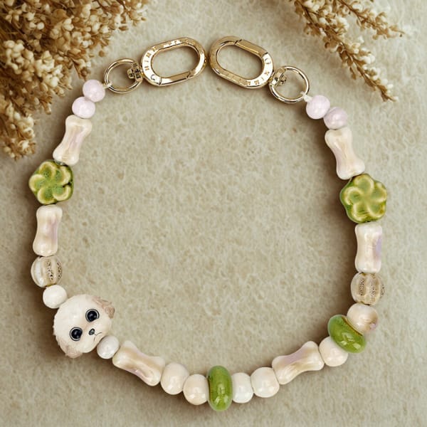 Zawieszka na torebkę handstrap Nimmy New Big Eye Cute Pets 2.0 brązowy