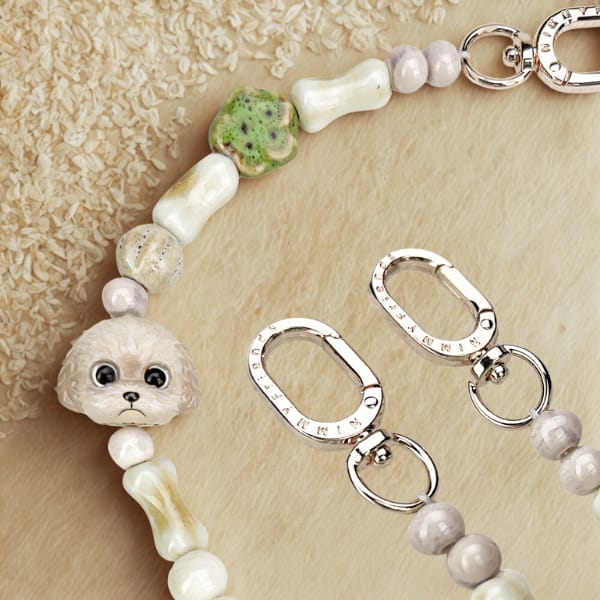 Zawieszka na torebkę handstrap Nimmy New Big Eye Cute Pets 2.0 brązowy