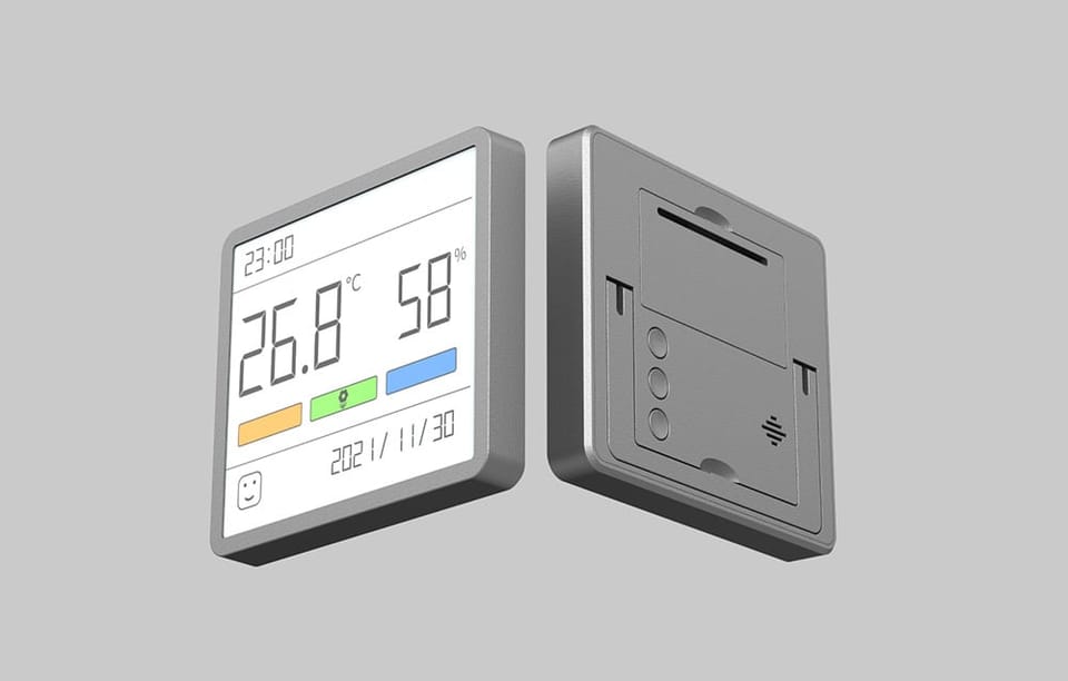 Dwa termo-higrometry – jeden z widocznym ekranem, drugi odwrócony tyłem