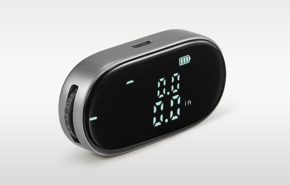 Owalna miara elektroniczna z cyfrowym wyświetlaczem na szarym tle