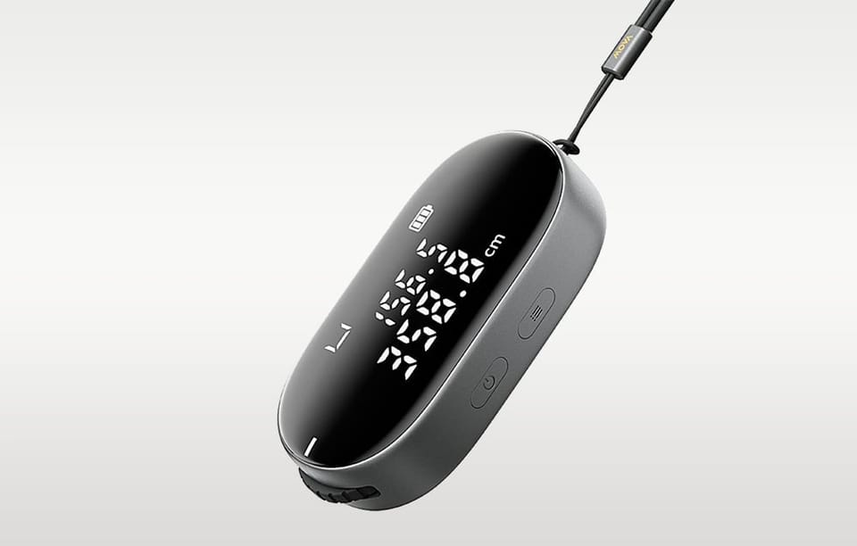 Mała miara elektroniczna z ekranem na szarym tle