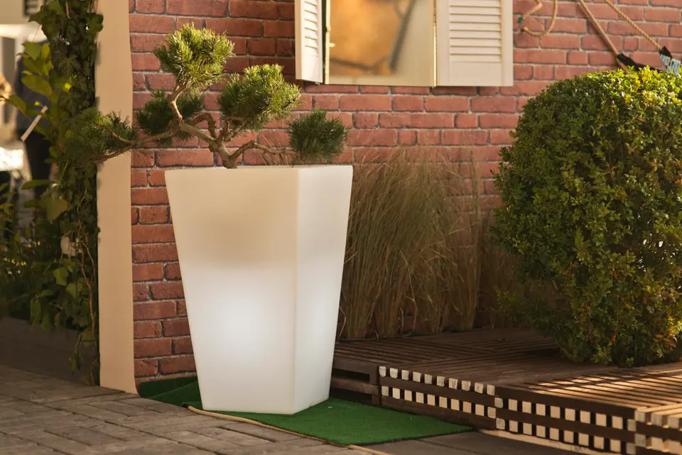 Slim white garden pot with lighting